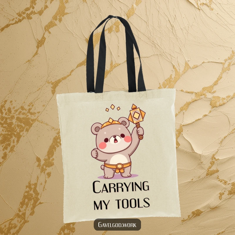 Funny Kawaii bear character triumphantly raising a small, ornate hammer, a humorous and practical tote bag.